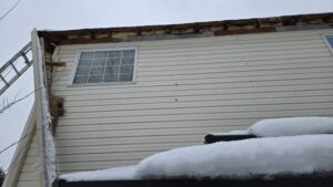 Damaged Gutter in the Winter Time