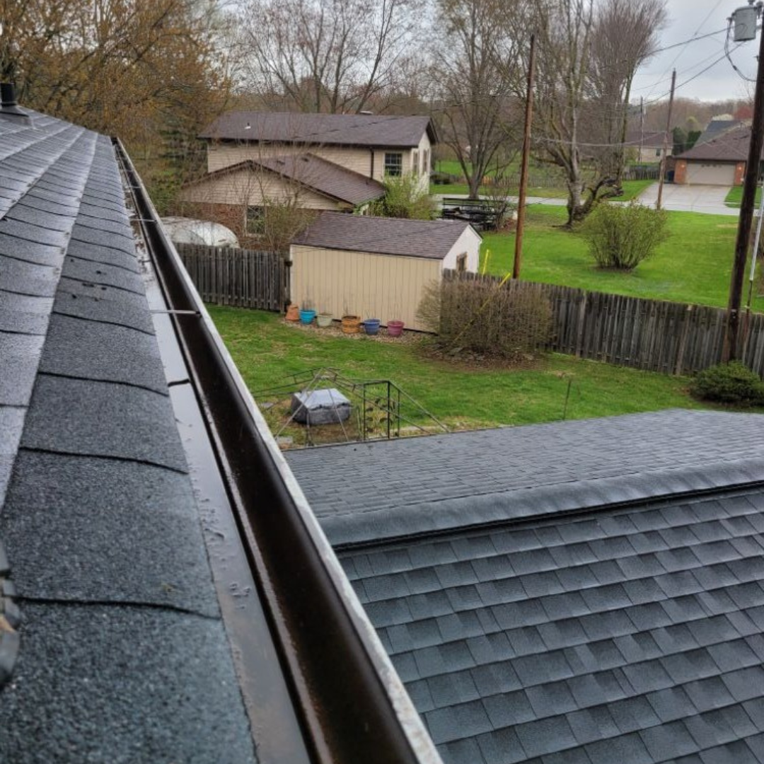 Untitled design - 2024-06-28T115211.312 Gutters filled with rainwater in Noblesville, Indiana